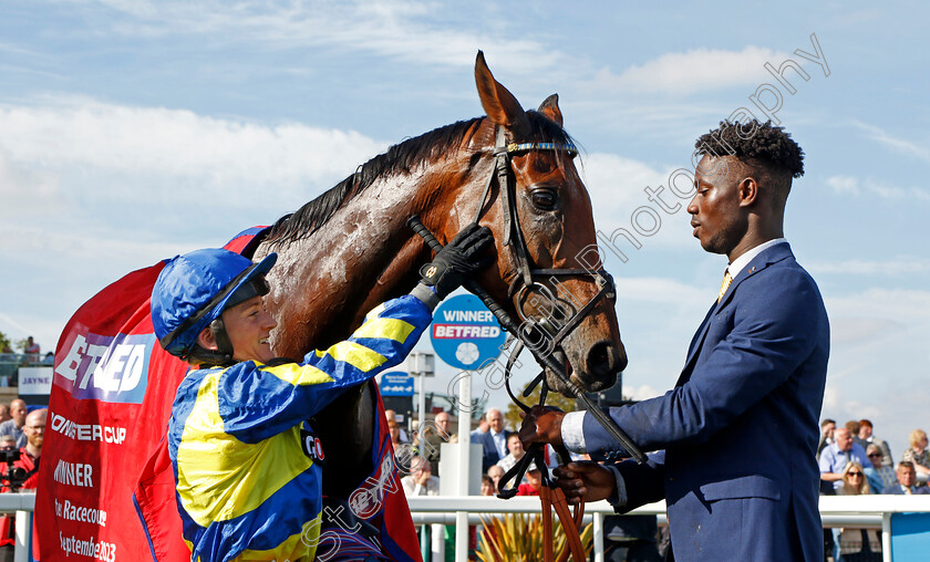 Trueshan-0014 
 TRUESHAN (Hollie Doyle) with groom Eliman Jeng after The Betfred Doncaster Cup
Doncaster 15 Sep 2023 - Pic Steven Cargill / Racingfotos.com