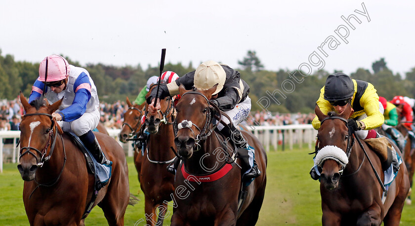 Alfa-Kellenic-0001 
 ALFA KELLENIC (centre, Tom Eaves) beats QUEEN OF MOUGINS (left) in The British EBF Fillies Handicap
York 22 Aug 2024 - Pic Steven Cargill / Racingfotos.com