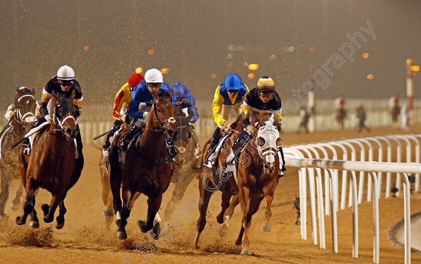 Don t-Give-Up-0003 
 DON'T GIVE UP (centre, Gerald Mosse) at the first turn with GRAND ARGENTIER (left) and ACTIVE SPIRIT (right) on his way to winning The EGA Potlines Trophy Handicap Meydan 25 Jan 2018 - Pic Steven Cargill / Racingfotos.com