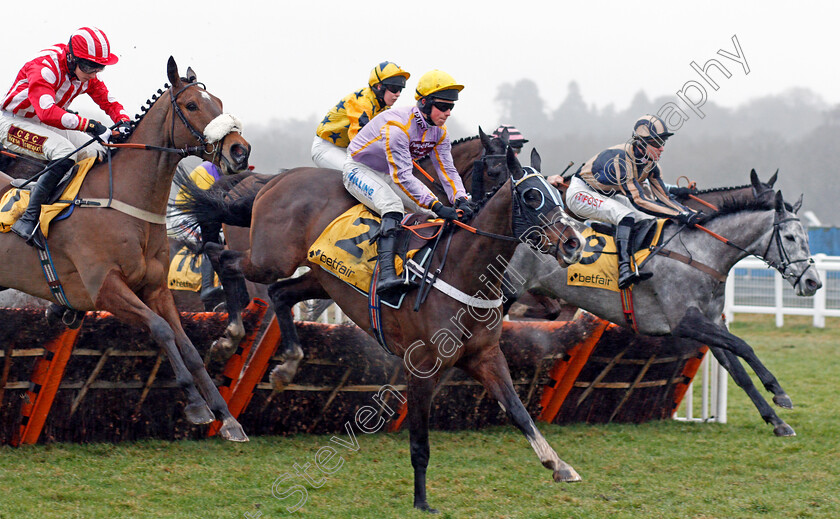 Jenkins-0001 
 JENKINS (James Bowen) jumps with REMILUC (left) and MISTERTON (right) Newbury 10 Feb 2018 - Pic Steven Cargill / Racingfotos.com