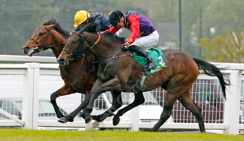 Crystal-Ocean-0006 
 CRYSTAL OCEAN (farside, Ryan Moore) beats FABRICATE (nearside) in The bet365 Gordon Richards Stakes Sandown 27 Apr 2018 - Pic Steven Cargill / Racingfotos.com