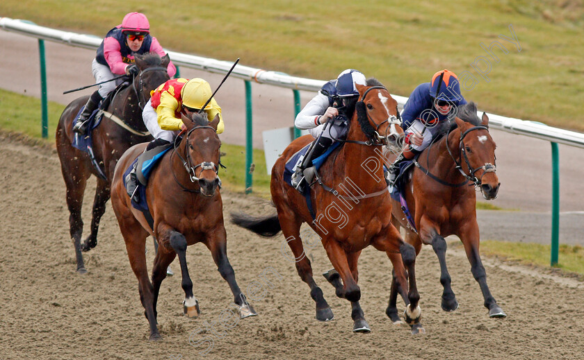 Hasanoanda-0004 
 HASANOANDA (centre, Robert Havlin) beats AMBIENT (left) and CRAVING (right) in The 32Red.com Novice Median Auction Stakes Lingfield 6 Jan 2018 - Pic Steven Cargill / Racingfotos.com