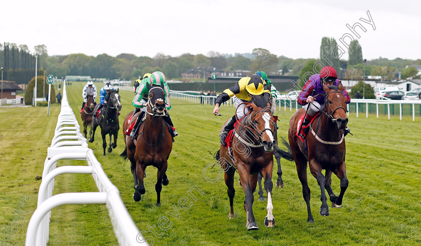 Haddaf-0001 
 HADDAF (centre, Ryan Moore) beats DIAMOND DOUGAL (right) in The bet365 Handicap Sandown 27 Apr 2018 - Pic Steven Cargill / Racingfotos.com