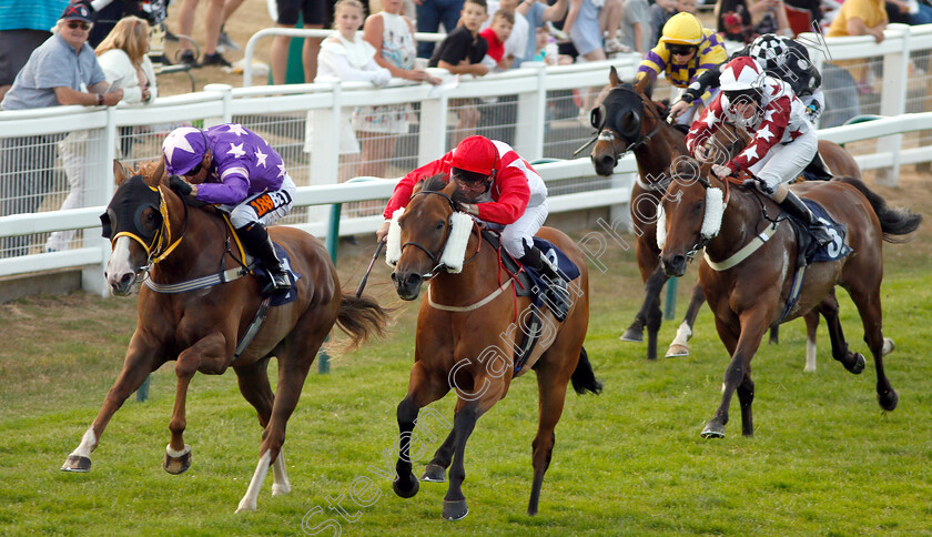 Deeds-Not-Words-0001 
 DEEDS NOT WORDS (centre, John Egan) beats ARCANISTA (left) in The Aeropak Handicap
Yarmouth 18 Jul 2018 - Pic Steven Cargill / Racingfotos.com