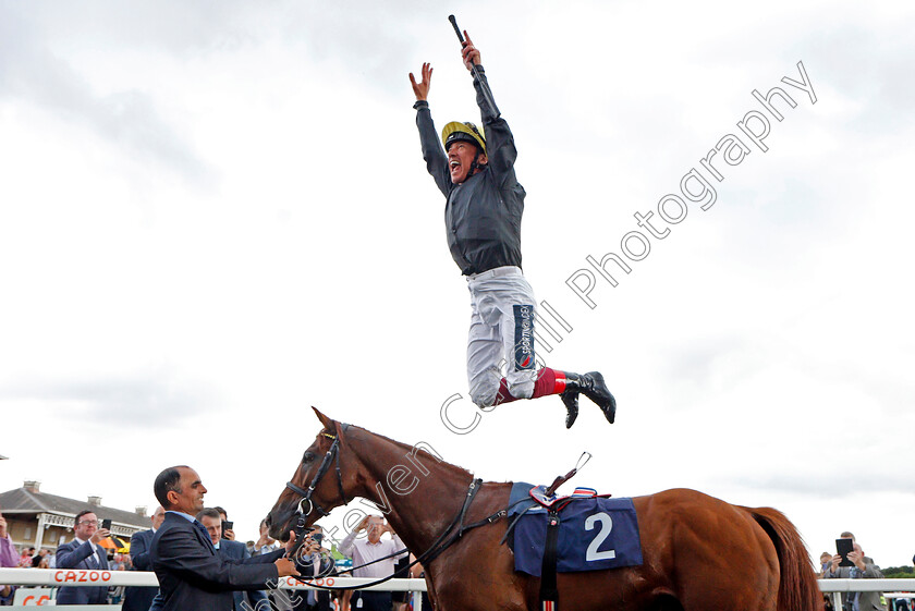 Stradivarius-0011 
 Frankie Dettori leaps from STRADIVARIUS after The Doncaster Cup
Doncaster 10 Sep 2021 - Pic Steven Cargill / Racingfotos.com