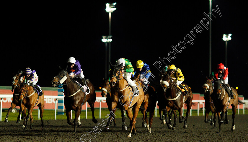 Mr-Mac-0001 
 MR MAC (centre, Tom Marquand) wins The Close Brothers Business Finance Handicap Kempton 13 Dec 2017 - Pic Steven Cargill / Racingfotos.com