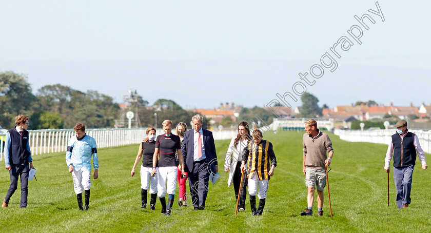 Yarmouth-Abandonment-0004 
 RICHARD ALDOUS (suit) clerk of the course at Yarmouth Racecourse, on the track with jockeys P J MCDONALD (stripes), HAYLEY TURNER and LUKE MORRIS (left) before racing is abandoned after 3 races
Yarmouth 3 Aug 2020 - Pic Steven Cargill / Racingfotos.com