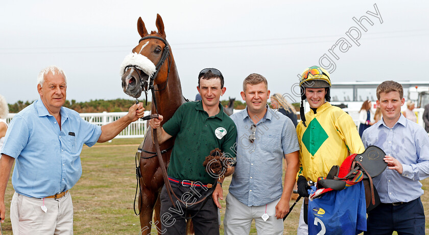 Man-Of-The-Sea-0007 
 MAN OF THE SEA (Brendan Powell) with trainer Neil Mulholland (right) and owner Mike Burbidge (left) after The Sue & Nigel Pritchard Sprint Handicap
Les Landes Jersey 26 Aug 2019 - Pic Steven Cargill / Racingfotos.com