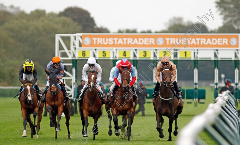 Divine-Comedy-0009 
 DIVINE COMEDY (2nd right, Kaiya Fraser) with the field on her way to winning The Trustatrader Fully Vetted Tradespeople Fillies Handicap
Nottingham 11 Oct 2023 - Pic Steven Cargill / Racingfotos.com