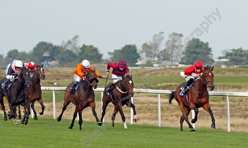 Prydwen-0001 
 PRYDWEN (orange, Marco Ghiani) beats ROGUE POWER (right) and FLOWER OF THUNDER (right) in The Cazoo Search Drive Smile Handicap
Yarmouth 19 Oct 2021 - Pic Steven Cargill / Racingfotos.com