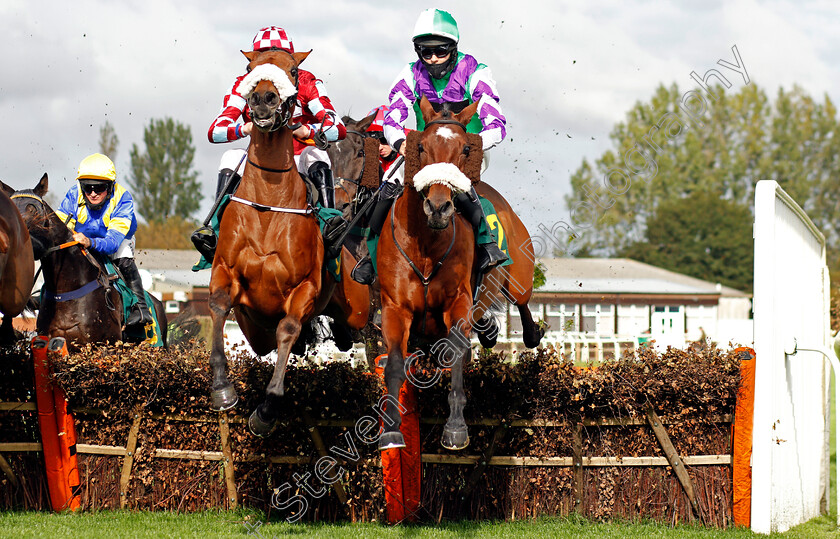 The-Twisler-0001 
 THE TWISLER (right, Harry Reed) with TAHEN (left, Fergus Gregory) on his way to winning The Watch Fakenham Replays On attheraces.com Conditional Jockeys Selling Handicap Hurdle
Fakenham 16 Oct 2020 - Pic Steven Cargill / Racingfotos.com