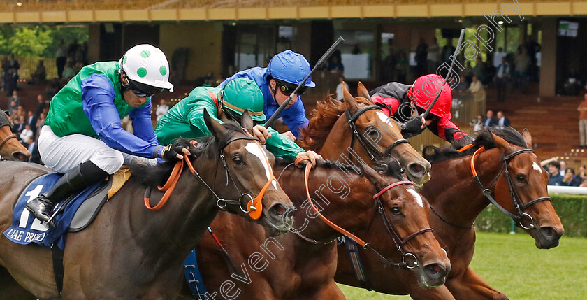 Rouhiya-0001 
 ROUHIYA (2nd left, Maxime Guyon) beats KATHMANDU (left) ROMANTIC STYLE (2nd right) and VESPERTILIO (right) in The Emirates Poule d'Essai des Pouliches
Longchamp 12 May 2024 - Pic Steven Cargill / Racingfotos.com