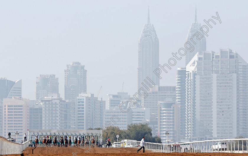 Jebel-Ali-0005 
 Horses break from the stalls down the back straight at Jebel Ali, Dubai 9 Feb 2018 - Pic Steven Cargill / Racingfotos.com