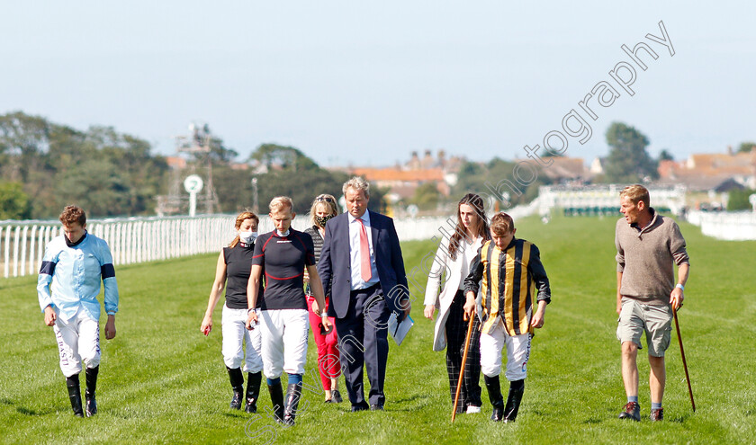 Yarmouth-Abandonment-0003 
 RICHARD ALDOUS (suit) clerk of the course at Yarmouth Racecourse, on the track with jockeys P J MCDONALD (stripes), HAYLEY TURNER and LUKE MORRIS (left) before racing is abandoned after 3 races
Yarmouth 3 Aug 2020 - Pic Steven Cargill / Racingfotos.com