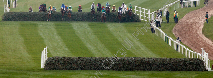 Balnaslow-0001 
 BALNASLOW (left in green, Derek O'Connor) with the leaders over the first fence in The Randox Health Foxhunters Chase Aintree 12 Apr 2018 - Pic Steven Cargill / Racingfotos.com