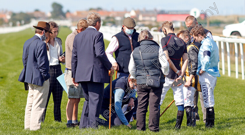 Yarmouth-Abandonment-0001 
 Officials and jockeys inspect the track before racing is abandoned after 3 races
Yarmouth 3 Aug 2020 - Pic Steven Cargill / Racingfotos.com