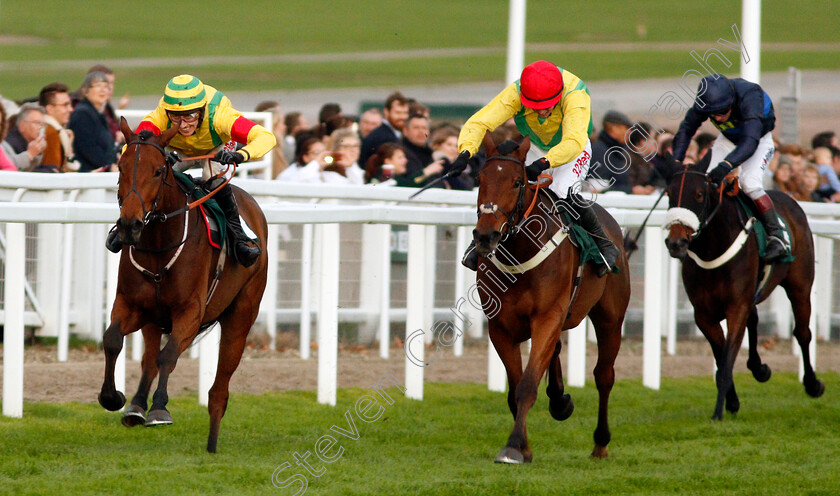 Herecomestheboom-0003 
 HERECOMESTHEBOOM (left, Paddy Brennan) beats AINCHEA (centre) in The Jockey Club Venues Standard Open National Hunt Flat Race Cheltenham 28 Oct 2017 - Pic Steven Cargill / Racingfotos.com