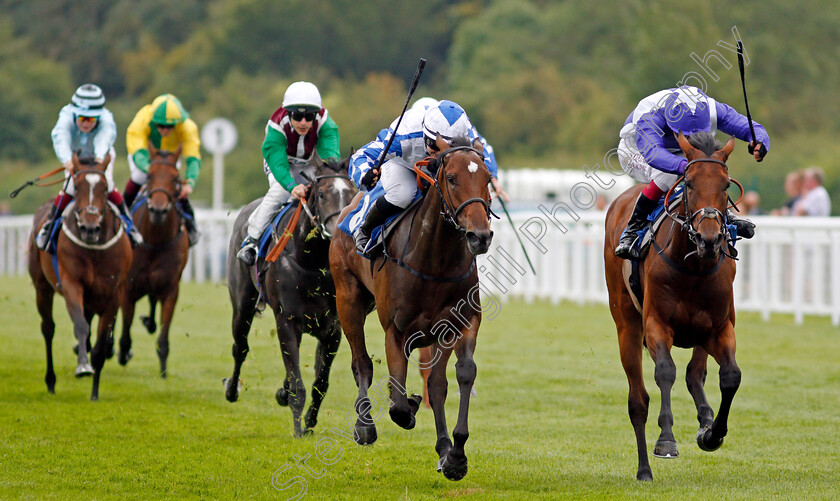 Thebeautifulgame-0003 
 THEBEAUTIFULGAME (left, Laura Pearson) beats MISTRIX (right) in The Byerley Stud British EBF Restricted Maiden Fillies Stakes
Salisbury 12 Aug 2021 - Pic Steven Cargill / Racingfotos.com