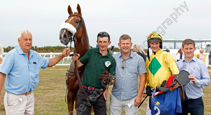 Man-Of-The-Sea-0006 
 MAN OF THE SEA (Brendan Powell) with trainer Neil Mulholland (right) and owner Mike Burbidge (left) after The Sue & Nigel Pritchard Sprint Handicap
Les Landes Jersey 26 Aug 2019 - Pic Steven Cargill / Racingfotos.com