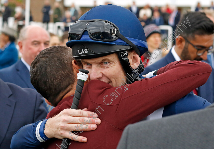 Havlin-0003 
 Robert Havlin is hugged by Frankie Dettori after his first Group 1 victory aboard COMMISSIONING in The bet365 Fillies Mile
Newmarket 7 Oct 2022 - Pic Steven Cargill / Racingfotos.com