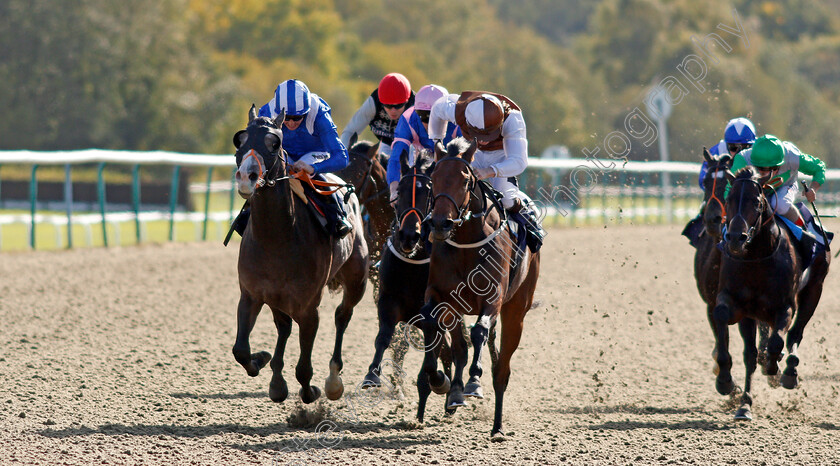 Motabassim-0004 
 MOTABASSIM (left, Jim Crowley) beats FLEETING FREEDOM (centre) in The Racing Welfare Nursery Lingfield 5 Oct 2017 - Pic Steven Cargill / Racingfotos.com