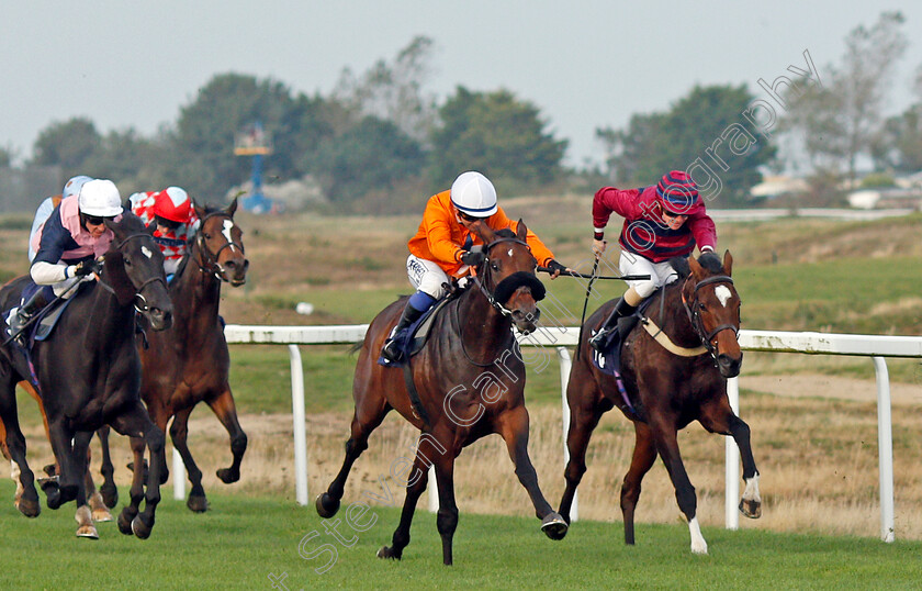 Prydwen-0002 
 PRYDWEN (orange, Marco Ghiani) beats FLOWER OF THUNDER (right) in The Cazoo Search Drive Smile Handicap
Yarmouth 19 Oct 2021 - Pic Steven Cargill / Racingfotos.com