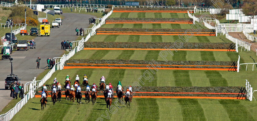 Livelovelaugh-0005 
 The field approaches the 4th fence in the Randox Topham Handicap Chase won by LIVELOVELAUGH
Aintree 9 Apr 2021 - Pic Steven Cargill / Racingfotos.com