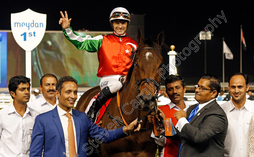 North-America-0015 
 NORTH AMERICA (Richard Mullen) with trainer Satish Seemar (2nd right) after The Al Maktoum Challenge (Round 3) Meydan Dubai 10 Mar 2018 - Pic Steven Cargill / Racingfotos.com