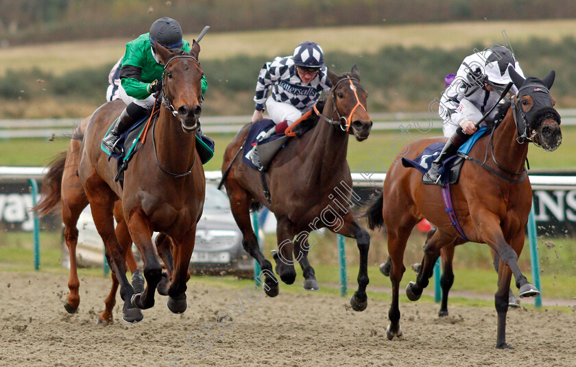 Amber-Island-0004 
 AMBER ISLAND (left, Laura Pearson) beats UNIQUE CUT (right) in The Play Coral Racing Super Series For Free EBF Fillies Handicap
Lingfield 1 Dec 2021 - Pic Steven Cargill / Racingfotos.com