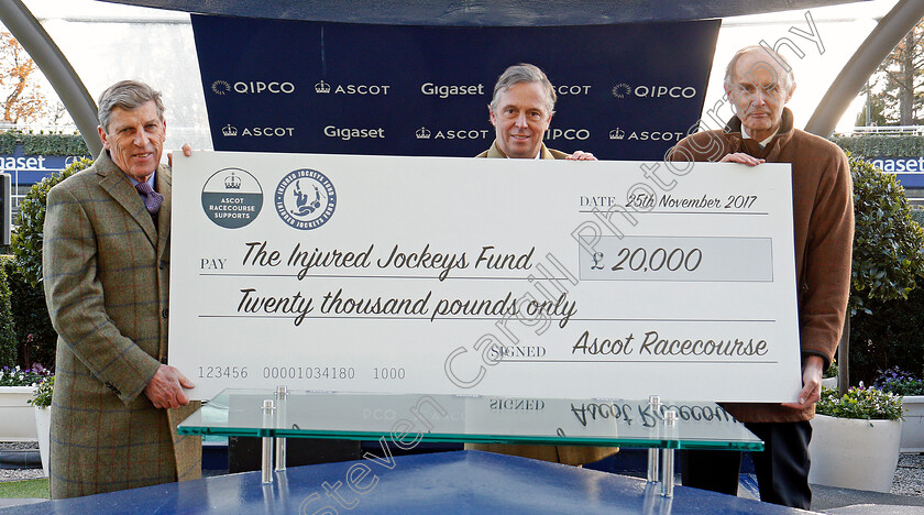 Presentation-to-IJF-0001 
 Presentation by Guy Henderson of Ascot Racecourse to the Injured Jockeys Fund represented by Brough Scott and Jonathan Powell Ascot 25 Nov 2017 - Pic Steven Cargill / Racingfotos.com