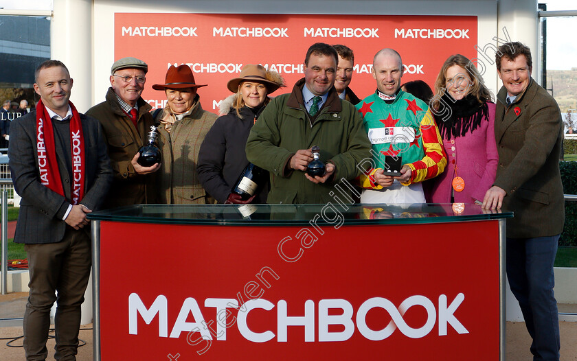 Lil-Rockerfeller-0006 
 Presentation to Neil King, Wayne Hutchinson and owners for The Matchbook Time To Move Over Novices Chase won by LIL ROCKERFELLER
Cheltenham 26 Oct 2018 - Pic Steven Cargill / Racingfotos.com