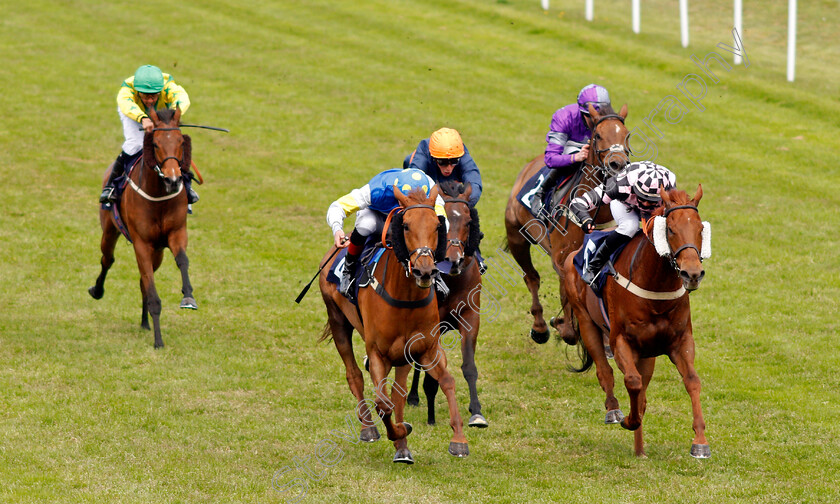 Raajihah-0002 
 RAAJIHAH (centre, Adam Kirby) beats SHYJACK (right) in The quinnbet.com Handicap
Yarmouth 19 May 2021 - Pic Steven Cargill / Racingfotos.com