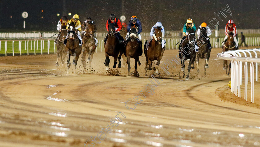 Franz-Strauss-0005 
 Into the first bend in the Longines Legend Diver Collection Handicap won by FRANZ STRAUSS (2nd right, Orange cap)
Meydan 27 Jan 2023 - Pic Steven Cargill / Racingfotos.com