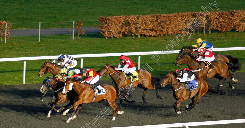 Paddy-A-0001 
 PADDY A (green, Ben Curtis) beats DANGEROUS ENDS (2) in The 32Red Casino Handicap Kempton 11 Apr 2018 - Pic Steven Cargill / Racingfotos.com