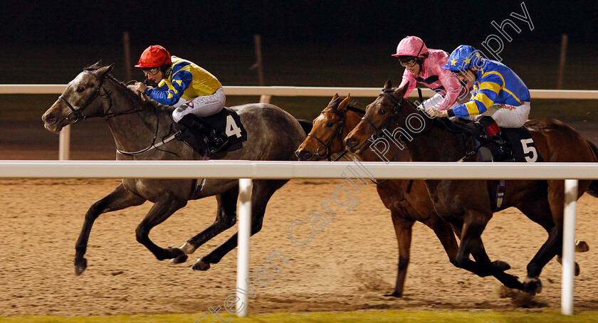 Dellaguista-0001 
 DELLAGUISTA (left, P J McDonald) beats TITAN GODDESS (right) in The Bet totequadpot At betfred.com Fillies Handicap Chelmsford 21 Dec 2017 - Pic Steven Cargill / Racingfotos.com