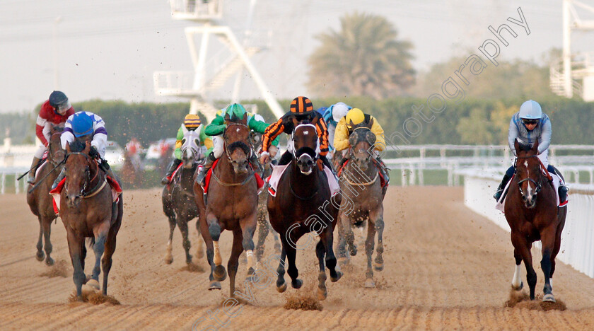 Kimbear-0002 
 KIMBEAR (centre, Pat Dobbs) beats SECRET AMBITION (2nd left) MUSAWAAT (left) and HEAVY METAL (right) in The Burj Nahaar Meydan Dubai 10 Mar 2018 - Pic Steven Cargill / Racingfotos.com