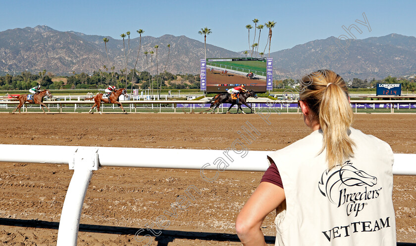 Santa-Anita-0005 
 A member of the Vet team watches a race finish ahead of the Breeders' Cup
Santa Anita 31 Oct 2019 - Pic Steven Cargill / Racingfotos.com