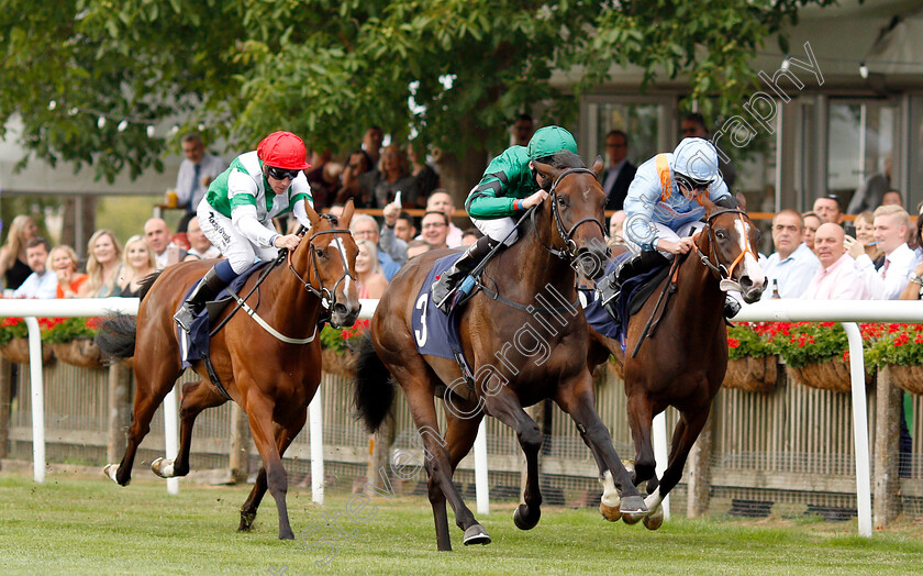 Pennywhistle-0001 
 PENNYWHISTLE (centre, Robert Havlin) beats EMBRACE THE MOMENT (right) and BLISSFUL BEAUTY (left) inThe Fly London Southend Airport To Milan Fillies Novice Stakes
Newmarket 20 Jul 2018 - Pic Steven Cargill / Racingfotos.com