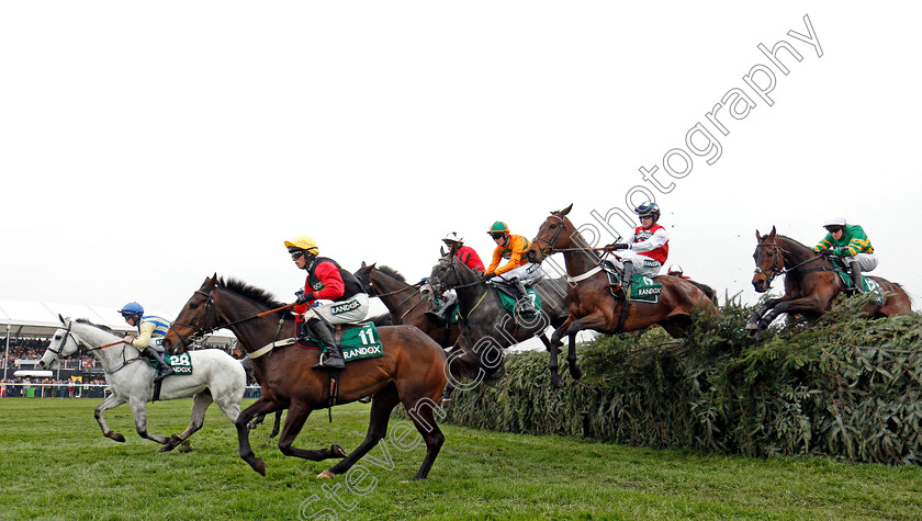 Ultragold-0004 
 ULTRAGOLD (11, Harry Cobden) leads over the first on his way to winning The Randox Health Topham Handicap Chase Aintree 13 Apr 2018 - Pic Steven Cargill / Racingfotos.com