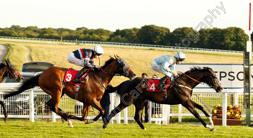 Revich-0004 
 REVICH (Luke Morris) beats SIR BUSKER (left) in The Racing Welfare For All Racing's Workforce Handicap
Epsom 4 Jul 2019 - Pic Steven Cargill / Racingfotos.com