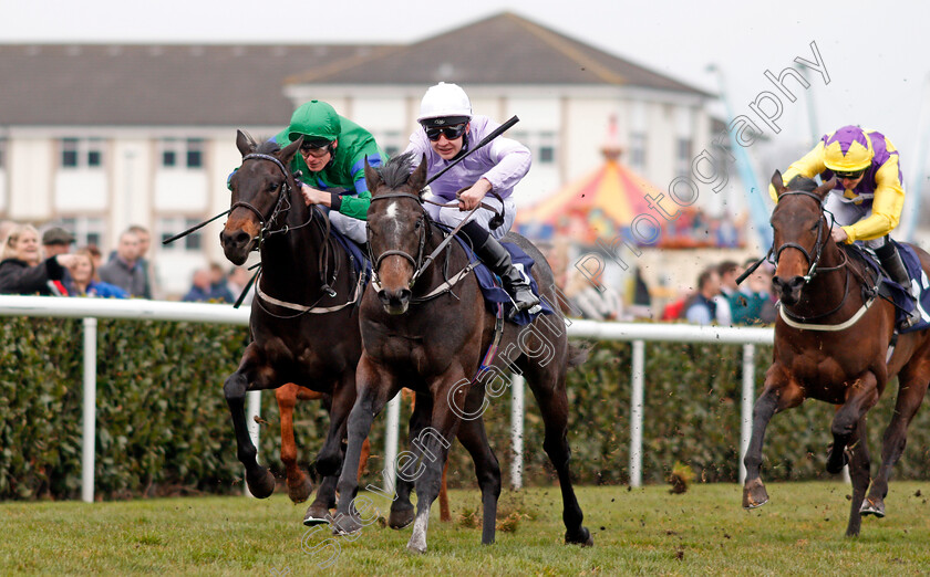 Izzer-0003 
 IZZER (centre, Charles Bishop) beats BROKEN SPEAR (left) in The Unibet Brocklesby Stakes Doncaster 24 Mar 2018 - Pic Steven Cargill / Racingfotos.com