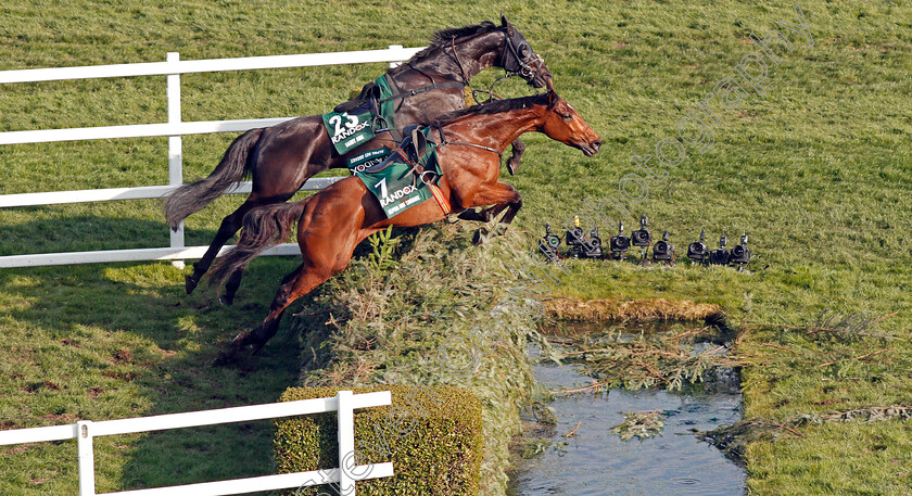 Saint-Are-and-Alpha-Des-Obeaux-0001 
 SAINT ARE (farside) and ALPHA DES OBEAUX over The Water in The Randox Health Grand National Aintree 14 Apr 2018 - Pic Steven Cargill / Racingfotos.com