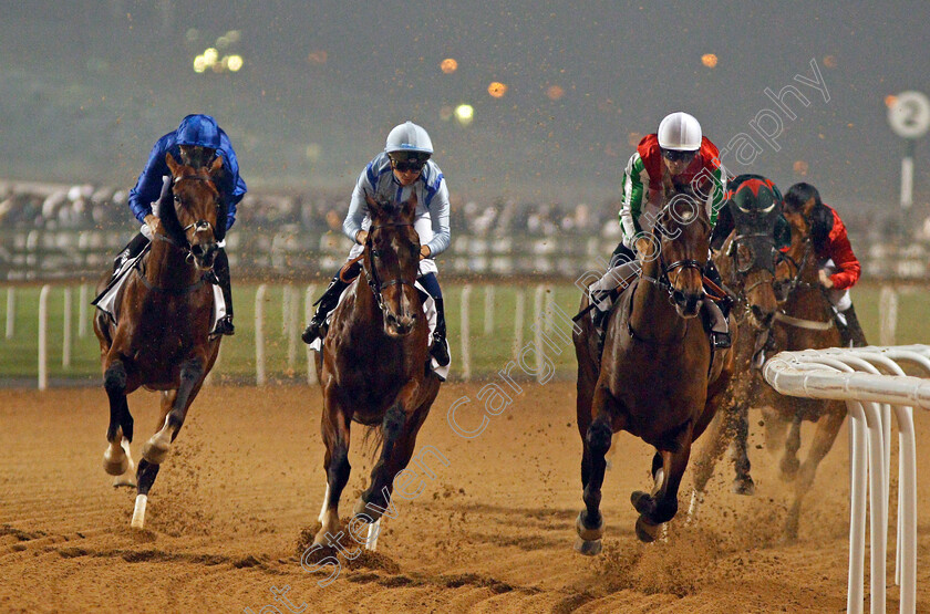 Thunder-Snow-0003 
 THUNDER SNOW (left, Christophe Soumillon) at the first turn with HEAVY METAL (centre) and NORTH AMERICA (right) on his way to winning The Al Maktoum Challenge Round 2 Meydan 8 Feb 2018 - Pic Steven Cargill / Racingfotos.com