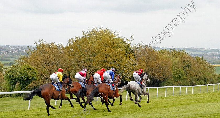 Pretty-Jewel-0005 
 PRETTY JEWEL (blue, Luke Catton) tracks the leaders on her way to winning The Peter Symonds Catering Fillies Handicap Salisbury 30 Apr 2018 - Pic Steven Cargill / Racingfotos.com