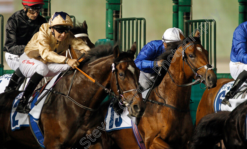 Dubai-Future-0001 
 DUBAI FUTURE (white cap, Harry Bentley) breaks from the stalls before winning The P & O Marinas Handicap
Meydan 23 Jan 2020 - Pic Steven Cargill / Racingfotos.com