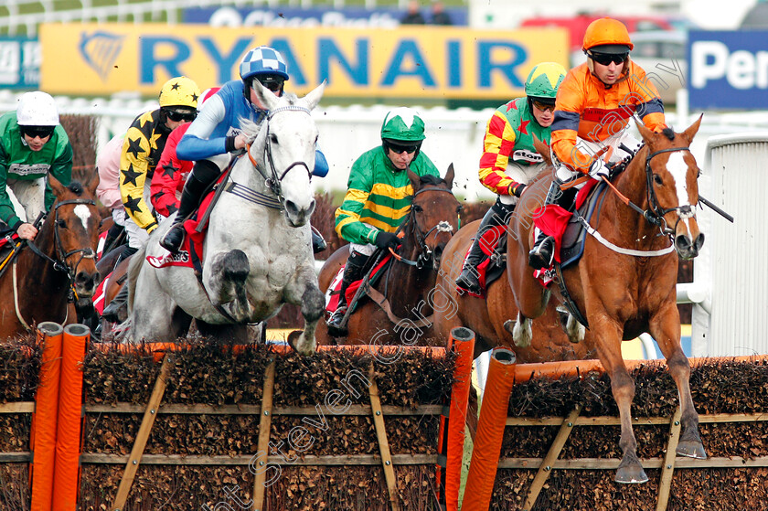 Sam-Spinner-and-Donna s-Diamond-0001 
 SAM SPINNER (right, Joe Colliver) jumps with DONNA'S DIAMOND (left) Cheltenham 15 Mar 2018 - Pic Steven Cargill / Racingfotos.com