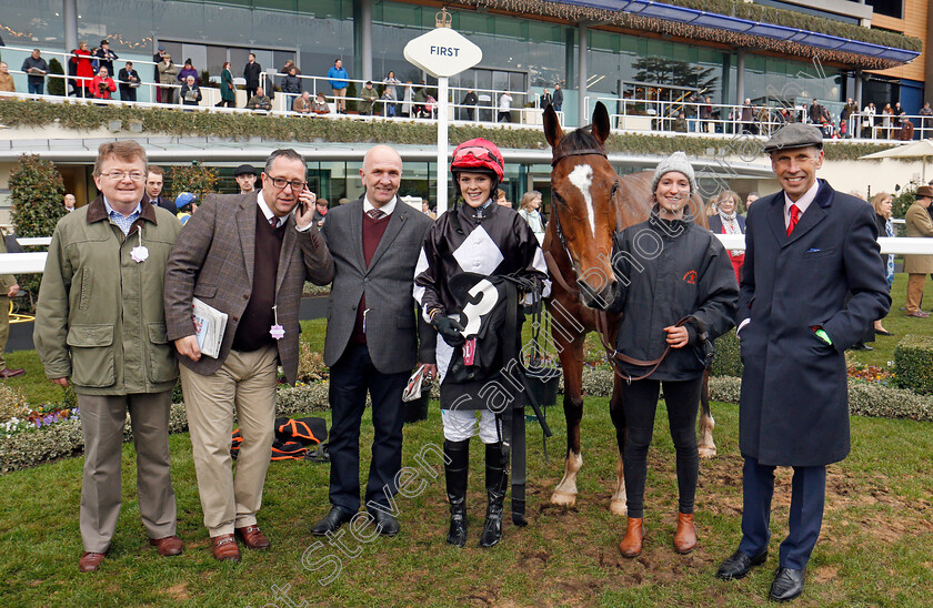 One-Of-Us-0007 
 ONE OF US (Lizzie Kelly) with trainer Nick Williams and the Forty Winks Syndicate after The Foundation Developments Novices Handicap Hurdlle Ascot 23 Dec 2017 - Pic Steven Cargill / Racingfotos.com