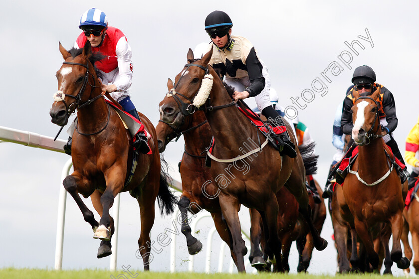 Against-The-Odds-0006 
 AGAINST THE ODDS (left, Fran Berry) leads the field at Sandown
Sandown 16 Jun 2018 - Pic Steven Cargill / Racingfotos.com