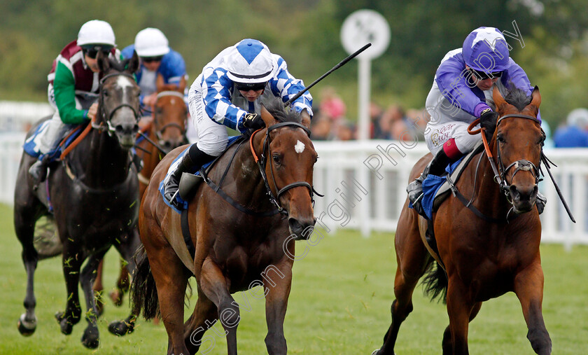 Thebeautifulgame-0005 
 THEBEAUTIFULGAME (left, Laura Pearson) beats MISTRIX (right) in The Byerley Stud British EBF Restricted Maiden Fillies Stakes
Salisbury 12 Aug 2021 - Pic Steven Cargill / Racingfotos.com