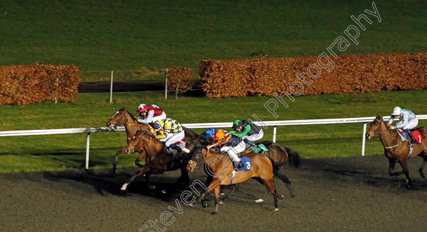 Zoom-Zoom-Babe-0001 
 ZOOM ZOOM BABE (blue cap, Theodore Ladd) beats MAJESTIC TEJAAN (yellow cap) and HOLD FAST (3) in The Try Our New Price Boosts At Unibet Fillies Handicap
Kempton 16 Feb 2022 - Pic Steven Cargill / Racingfotos.com